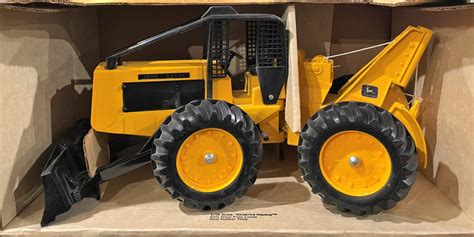 john deere skid steer loader toy|john deere log skidder toy.